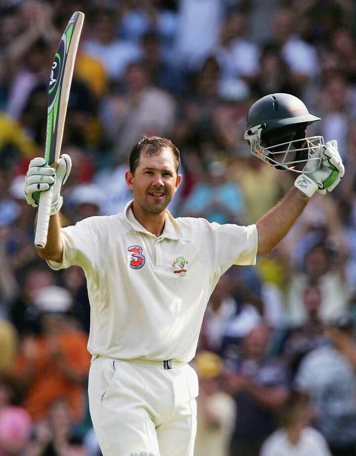 RICKY PONTING holding a bat and helmet